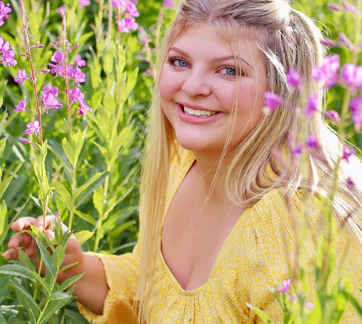 a beautiful girl in the flowers garden